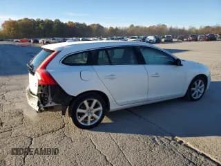 ✅ 2017 Volvo V60 Premier • VIN: YV140MSK6H1360218 • Лот: 90469595. Опубликован ранее на Copart с пробегом 60 702 миль. Бесплатный доступ к архиву аукционных продаж из США и подробный отчёт об истории автомобиля на DreamBid. Изображение 3.