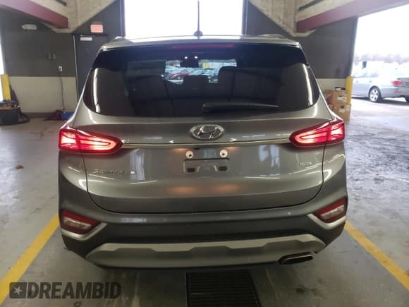 ✅ 2019 Hyundai Santa Fe SE • VIN: 5NMS2CAD6KH120975 • Lot: 68759392. Wystawiony na Copart z przebiegiem 51 647 mil. Bezpłatny archiwum sprzedaży aukcyjnych z USA i szczegółowy raport historii pojazdu na DreamBid. Zdjęcie 6.