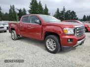 ✅ 2015 GMC Canyon 4WD SLT • VIN: 1GTG6CE39F1270042 • Lot: 60497565. Listed on Copart with 33,714 mi. Free auction sales archive from the USA and detailed vehicle history report at DreamBid. Image 4.