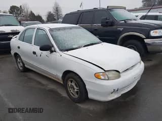 ✅ 1999 Hyundai Accent GL • VIN: KMHVF24N1XU583604 • Лот: 41613240. Опубликован ранее на IAAI с пробегом 163 938 миль. Бесплатный доступ к архиву аукционных продаж из США и подробный отчёт об истории автомобиля на DreamBid. Изображение 1.