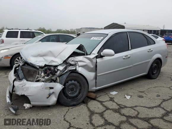 ✅ 2006 Suzuki Forenza • VIN: KL5JD56Z76K411376 • Lot: 82751694. Listed on Copart with Not provided. Free auction sales archive from the USA and detailed vehicle history report at DreamBid. Image 1.