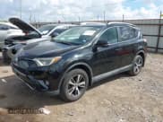 ✅ 2016 Toyota RAV4 XLE • VIN: 2T3RFREV2GW499811 • Lot: 43278390. Listed on IAAI with 148,028 mi. Free auction sales archive from the USA and detailed vehicle history report at DreamBid. Image 17.