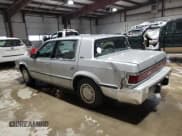 ✅ 1989 Dodge Dynasty • VIN: 1B3BC4634KD442902 • Lot: 85151394. Listed on Copart with 63,120 mi. Free auction sales archive from the USA and detailed vehicle history report at DreamBid. Image 2.
