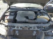 ✅ 2013 Chrysler 300 C • VIN: 2C3CCAEG2DH606552 • Lot: 66717365. Listed on Copart with 127,389 mi. Free auction sales archive from the USA and detailed vehicle history report at DreamBid. Image 11.