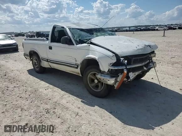 2000 Chevrolet S-10 LS with VIN 1GCCS14W9YK169476, listed as a Copart auction lot 71400374 with 290,498 mi miles and Salvage title. Bid and sale history available at DreamBid. Image 11.