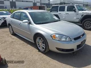 2012 Chevrolet Impala LTZ z VIN 2G1WC5E38C1332996, wystawiony jako IAAI lot #43393885 z przebiegiem 128 779 mil mil oraz . Historia ofert i sprzedaży dostępna na DreamBid. Obrazek 1.