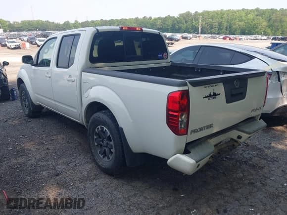 ✅ 2015 Nissan Frontier S • VIN: 1N6AD0EV0FN717018 • Lot: 42322428. Listed on IAAI with 104,715 mi. Free auction sales archive from the USA and detailed vehicle history report at DreamBid. Image 3.