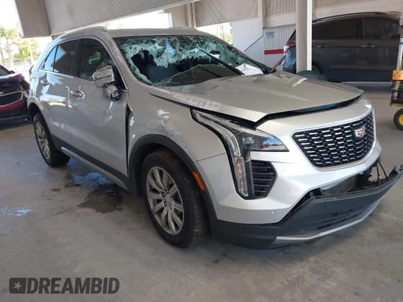 ✅ 2022 Cadillac XT4 FWD Premium Luxury • VIN: 1GYFZCR47NF100201 • Lot: 43403477. Listed on IAAI with 59,503 mi. Free auction sales archive from the USA and detailed vehicle history report at DreamBid. Image 1.