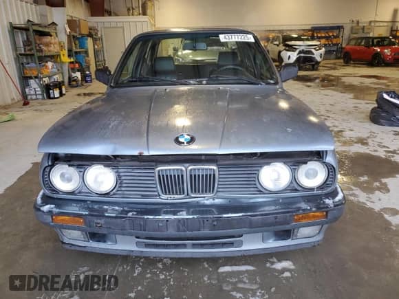 1989 BMW 3 Series 325i with VIN WBAAD2305KED23370, listed as a Copart auction lot 43777225 with 194,949 mi miles and Salvage title. Bid and sale history available at DreamBid. Image 5.
