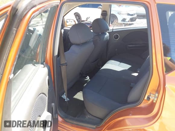 ✅ 2007 Chevrolet Aveo LS • VIN: KL1TD66697B746324 • Lot: 40257318. Wystawiony na IAAI z przebiegiem 144 789 mil. Bezpłatny archiwum sprzedaży aukcyjnych z USA i szczegółowy raport historii pojazdu na DreamBid. Zdjęcie 8.