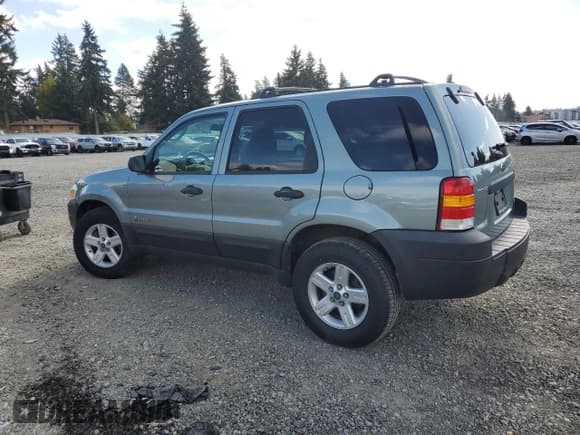 ✅ 2006 Ford Escape Hybrid • VIN: 1FMCU96H26KC28349 • Lot: 84256835. Wystawiony na Copart z przebiegiem 185 083 mil. Bezpłatny archiwum sprzedaży aukcyjnych z USA i szczegółowy raport historii pojazdu na DreamBid. Zdjęcie 2.