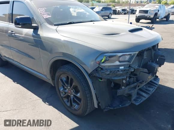 2021 Dodge Durango GT with VIN 1C4RDHDG1MC689049, listed as a IAAI auction lot 42655128 with 112,896 mi miles and . Bid and sale history available at DreamBid. Image 1.