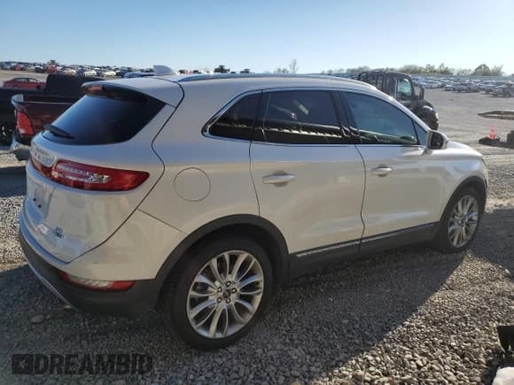 ✅ 2015 Lincoln MKC • VIN: 5LMCJ1A92FUJ20048 • Lot: 86220985. Listed on Copart with 40,271 mi. Free auction sales archive from the USA and detailed vehicle history report at DreamBid. Image 3.