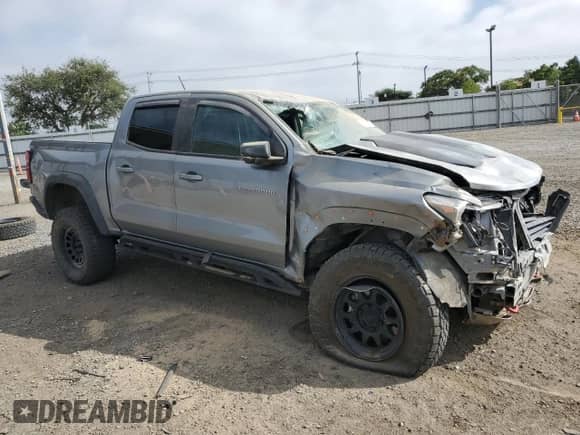 2023 Chevrolet Colorado 4WD ZR2 with VIN 1GCPTFEK5P1235565, listed as a Copart auction lot 61607045 with 42,500 mi miles and Salvage title. Bid and sale history available at DreamBid. Image 4.