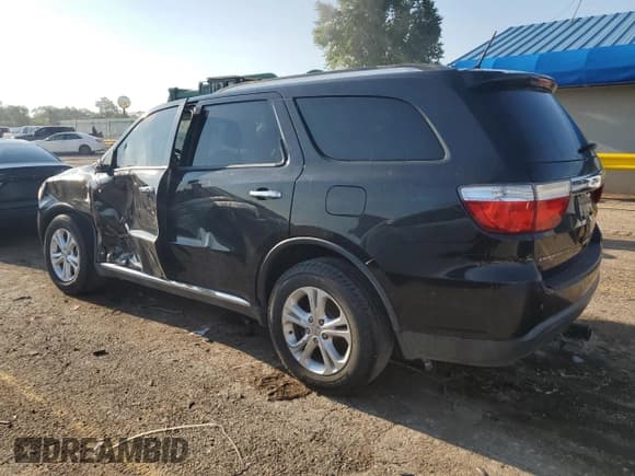 ✅ 2013 Dodge Durango Crew • VIN: 1C4RDHDGXDC659290 • Lot: 68123855. Listed on Copart with 156,685 mi. Free auction sales archive from the USA and detailed vehicle history report at DreamBid. Image 2.