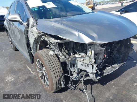 ✅ 2020 Lexus RX 350 • VIN: 2T2AZMAA2LC165451 • Lot: 43664524. Listed on IAAI with 103,122 mi. Free auction sales archive from the USA and detailed vehicle history report at DreamBid. Image 6.