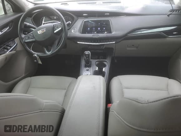 ✅ 2020 Cadillac XT4 FWD Luxury • VIN: 1GYAZAR46LF070460 • Lot: 49087665. Listed on Copart with 20,295 mi. Free auction sales archive from the USA and detailed vehicle history report at DreamBid. Image 8.