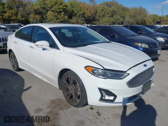 ✅ 2020 Ford Fusion Titanium • VIN: 3FA6P0D90LR173610 • Lot: 43705523. Wystawiony na IAAI z przebiegiem 158 452 mil. Bezpłatny archiwum sprzedaży aukcyjnych z USA i szczegółowy raport historii pojazdu na DreamBid. Zdjęcie 1.