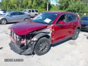 ✅ 2021 Mazda CX-5 Touring • VIN: JM3KFACM1M0481644 • Лот: 43606310. Опубликован ранее на IAAI с пробегом 28 531 миль. Бесплатный доступ к архиву аукционных продаж из США и подробный отчёт об истории автомобиля на DreamBid. Изображение 2.