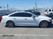 ✅ 2016 Audi A6 Premium Plus • VIN: WAUDFAFC8GN010776 • Lot: 42489470. Wystawiony na IAAI z przebiegiem 121 348 mil. Bezpłatny archiwum sprzedaży aukcyjnych z USA i szczegółowy raport historii pojazdu na DreamBid. Zdjęcie 14.