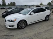 ✅ 2014 Kia Cadenza Premium • VIN: KNALN4D75E5162825 • Лот: 71092014. Опубликован ранее на Copart с пробегом 99 637 миль. Бесплатный доступ к архиву аукционных продаж из США и подробный отчёт об истории автомобиля на DreamBid. Изображение 1.