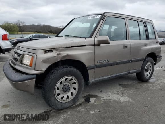 ✅ 1997 Suzuki Sidekick JX • VIN: 2S3TD03V4V6403519 • Lot: 49666085. Listed on Copart with 54,577 mi. Free auction sales archive from the USA and detailed vehicle history report at DreamBid. Image 1.