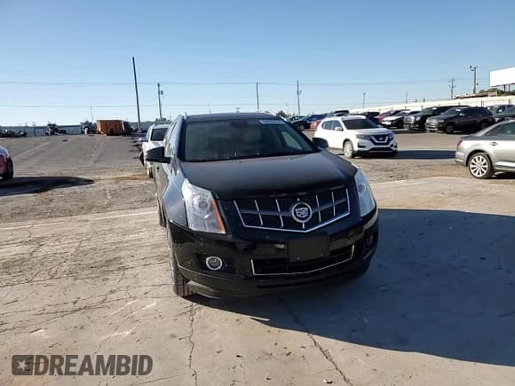 ✅ 2012 Cadillac SRX Performance Collection • VIN: 3GYFNBE33CS646165 • Lot: 90860355. Wystawiony na Copart z przebiegiem 157 539 mil. Bezpłatny archiwum sprzedaży aukcyjnych z USA i szczegółowy raport historii pojazdu na DreamBid. Zdjęcie 14.