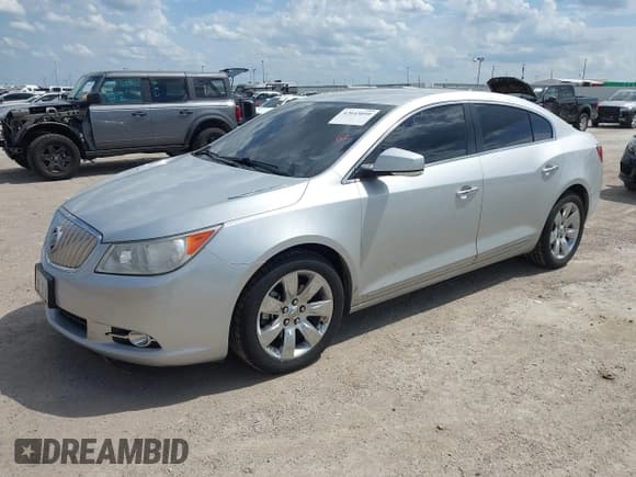 ✅ 2012 Buick LaCrosse Premium 1 • VIN: 1G4GD5G35CF106912 • Лот: 42643059. Опубликован ранее на IAAI с пробегом 91 326 миль. Бесплатный доступ к архиву аукционных продаж из США и подробный отчёт об истории автомобиля на DreamBid. Изображение 2.