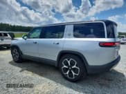 ✅ 2024 Rivian R1S Adventure • VIN: 7PDSGBBA2RN044497 • Lot: 61506055. Listed on Copart with 24,253 mi. Free auction sales archive from the USA and detailed vehicle history report at DreamBid. Image 2.