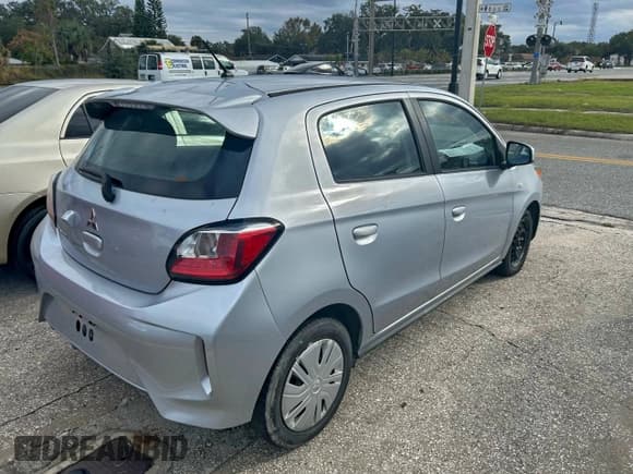 ✅ 2021 Mitsubishi Mirage ES • VIN: ML32AUHJ3MH011398 • Лот: 96622775. Опубликован ранее на Copart с пробегом 60 698 миль. Бесплатный доступ к архиву аукционных продаж из США и подробный отчёт об истории автомобиля на DreamBid. Изображение 4.