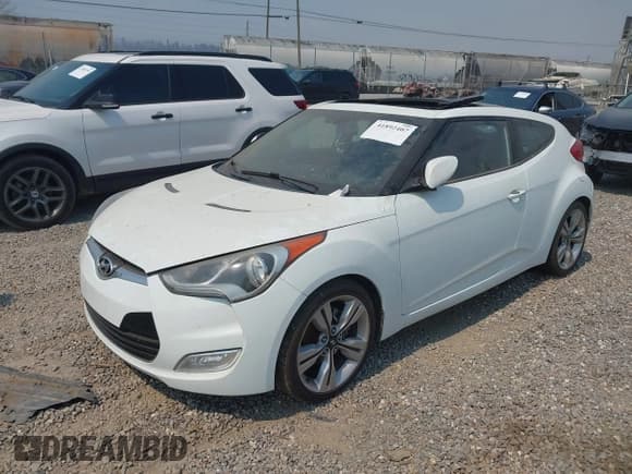 ✅ 2012 Hyundai Veloster w/Gray Int • VIN: KMHTC6AD7CU021221 • Lot: 41892407. Wystawiony na IAAI z przebiegiem 127 134 mil. Bezpłatny archiwum sprzedaży aukcyjnych z USA i szczegółowy raport historii pojazdu na DreamBid. Zdjęcie 2.