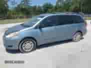 2009 Toyota Sienna LE with VIN 5TDBK23C89S028157, listed as a Copart auction lot 57068145 with 200,942 mi miles and Clean title. Bid and sale history available at DreamBid. Image 1.