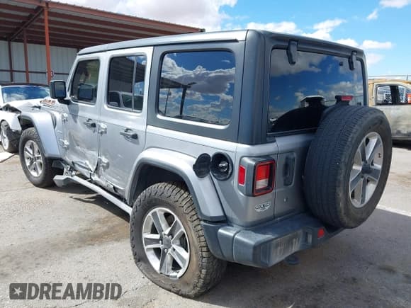 ✅ 2020 Jeep Wrangler Unlimited Sahara • VIN: 1C4HJXEN5LW235234 • Lot: 43328501. Listed on IAAI with 131,404 mi. Free auction sales archive from the USA and detailed vehicle history report at DreamBid. Image 3.