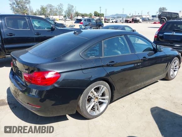 ✅ 2015 BMW 4 Series 428i • VIN: WBA4A9C56FGL85264 • Lot: 42397966. Listed on IAAI with 87,559 mi. Free auction sales archive from the USA and detailed vehicle history report at DreamBid. Image 4.