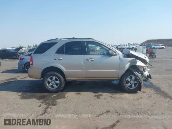 ✅ 2006 Kia Sorento LX • VIN: KNDJD733765577532 • Лот: 42722301. Опубликован ранее на IAAI с пробегом 173 695 миль. Бесплатный доступ к архиву аукционных продаж из США и подробный отчёт об истории автомобиля на DreamBid. Изображение 13.