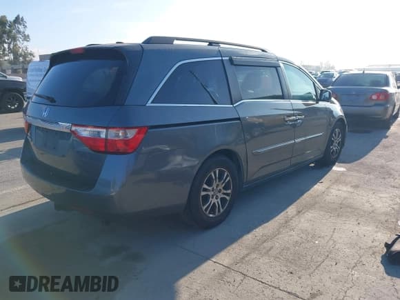 ✅ 2011 Honda Odyssey EX-L • VIN: 5FNRL5H63BB052585 • Lot: 43809942. Listed on IAAI with 224,917 mi. Free auction sales archive from the USA and detailed vehicle history report at DreamBid. Image 4.