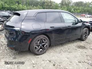 ✅ 2024 BMW iX xDrive50 • VIN: WB523CF09RCP70617 • Лот: 58091014. Опубликован ранее на Copart с пробегом 2 539 миль. Бесплатный доступ к архиву аукционных продаж из США и подробный отчёт об истории автомобиля на DreamBid. Изображение 3.