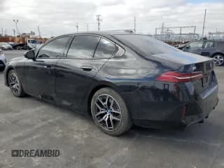 ✅ 2024 BMW i5 eDrive40 • VIN: WBY33FK01RCR58515 • Лот: 76064474. Опубликован ранее на Copart с пробегом 19 000 миль. Бесплатный доступ к архиву аукционных продаж из США и подробный отчёт об истории автомобиля на DreamBid. Изображение 2.