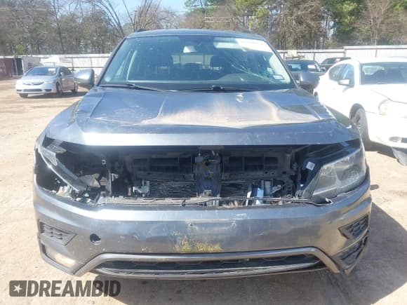 ✅ 2018 Volkswagen Tiguan SEL • VIN: 3VV3B7AX6JM001231 • Лот: 41781659. Опубликован ранее на IAAI с пробегом 137 930 миль. Бесплатный доступ к архиву аукционных продаж из США и подробный отчёт об истории автомобиля на DreamBid. Изображение 6.