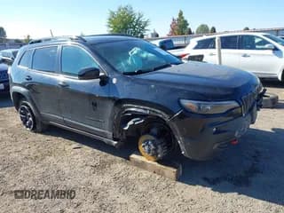 ✅ 2022 Jeep Cherokee Trailhawk • VIN: 1C4PJMBXXND504715 • Lot: 43442602. Wystawiony na IAAI z przebiegiem 52 136 mil. Bezpłatny archiwum sprzedaży aukcyjnych z USA i szczegółowy raport historii pojazdu na DreamBid. Zdjęcie 1.