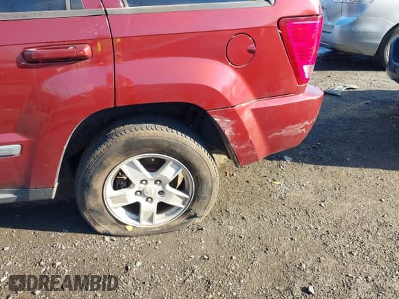 ✅ 2007 Jeep Grand Cherokee Laredo • VIN: 1J8GR48K57C581658 • Lot: 43511336. Listed on IAAI with 128,685 mi. Free auction sales archive from the USA and detailed vehicle history report at DreamBid. Image 6.