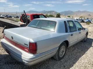 ✅ 1994 Lincoln Town Car Executive • VIN: 1LNLM81W8RY700250 • Lot: 65953514. Listed on Copart with Not provided. Free auction sales archive from the USA and detailed vehicle history report at DreamBid. Image 3.