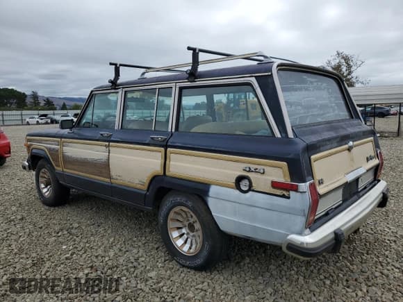 ✅ 1987 Jeep Grand Wagoneer • VIN: 1JCNJ15UXHT043452 • Lot: 86832505. Wystawiony na Copart z przebiegiem 159 429 mil. Bezpłatny archiwum sprzedaży aukcyjnych z USA i szczegółowy raport historii pojazdu na DreamBid. Zdjęcie 2.