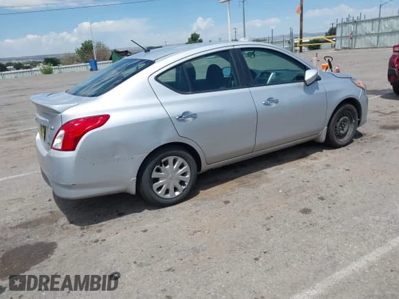 ✅ 2015 Nissan Versa S • VIN: 3N1CN7AP9FL893397 • Lot: 42683836. Listed on IAAI with 124,579 mi. Free auction sales archive from the USA and detailed vehicle history report at DreamBid. Image 4.