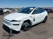 ✅ 2026 Tesla Model Y Long Range Launch Series • VIN: 7SAYGDEE6TF356259 • Лот: 42583010. Опубликован ранее на IAAI с пробегом 738 миль. Бесплатный доступ к архиву аукционных продаж из США и подробный отчёт об истории автомобиля на DreamBid. Изображение 2.