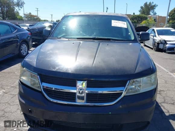 2010 Dodge Journey SE z VIN 3D4PG4FB2AT207958, wystawiony jako IAAI lot #43035194 z przebiegiem 120 227 mil mil oraz . Historia ofert i sprzedaży dostępna na DreamBid. Obrazek 12.