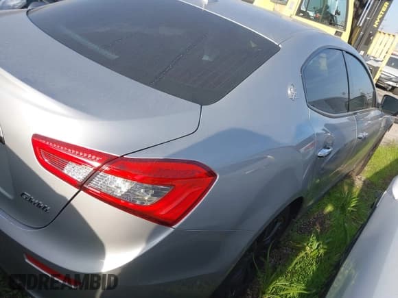 ✅ 2014 Maserati Ghibli • VIN: ZAM57XSA0E1105117 • Lot: 43917494. Listed on IAAI with 41,304 mi. Free auction sales archive from the USA and detailed vehicle history report at DreamBid. Image 4.