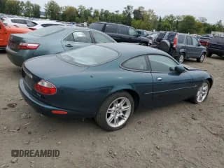 ✅ 2002 Jaguar XK • VIN: SAJDA41C92NA25147 • Лот: 71978064. Опубликован ранее на Copart с пробегом Не указан. Бесплатный доступ к архиву аукционных продаж из США и подробный отчёт об истории автомобиля на DreamBid. Изображение 3.