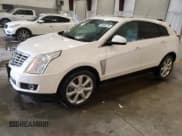 ✅ 2013 Cadillac SRX Premium Collection • VIN: 3GYFNEE37DS500032 • Lot: 93055275. Wystawiony na Copart z przebiegiem 76 495 mil. Bezpłatny archiwum sprzedaży aukcyjnych z USA i szczegółowy raport historii pojazdu na DreamBid. Zdjęcie 1.
