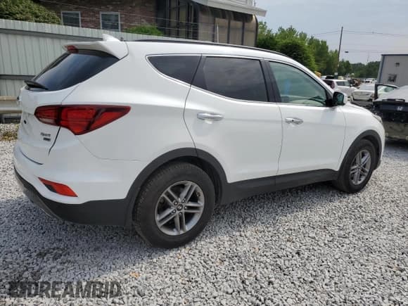 ✅ 2017 Hyundai Santa Fe 2.4L • VIN: 5XYZUDLB5HG455738 • Лот: 64665853. Опубликован ранее на Copart с пробегом 101 585 миль. Бесплатный доступ к архиву аукционных продаж из США и подробный отчёт об истории автомобиля на DreamBid. Изображение 3.